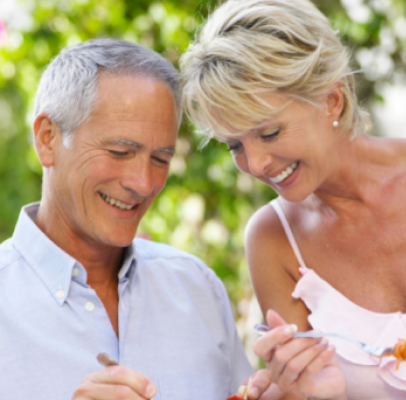 Patient living confidently with implant overdentures